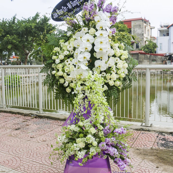 White and purple funeral flower arrangement Vietnam