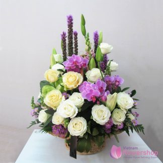 Basket of mixed flowers for female boss