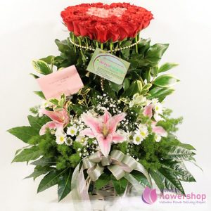 Basket of red roses mixed pink lily