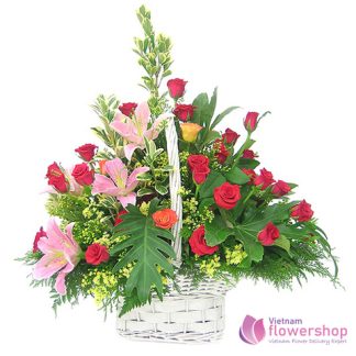 Red roses mixed pink lilies arrangement