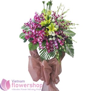 Sympathy flowers standing for delivery to Vietnam