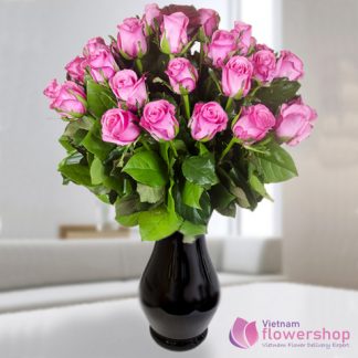 Vietnam flowers in vase with purple roses